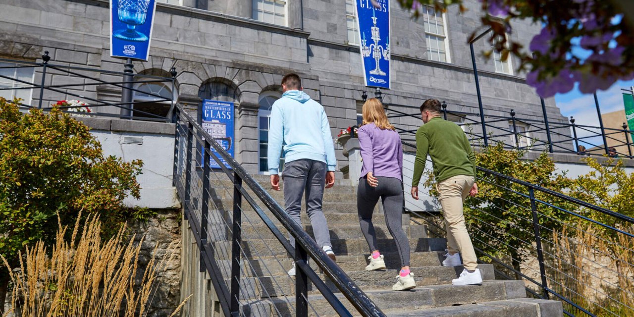 people walking up steps
